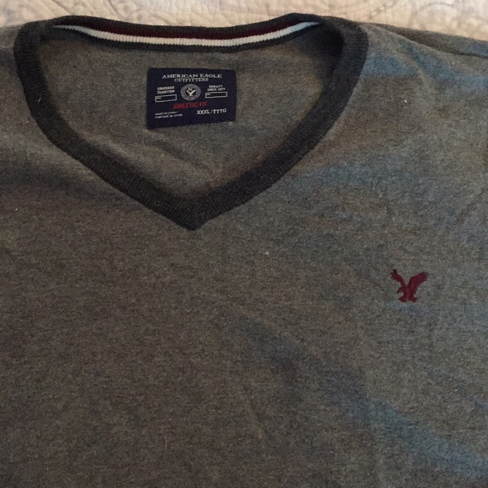 Men’s gray American Eagle Vneck sweater.